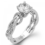 ROUND-CUT CRISS-CROSS ENGAGEMENT RING IN PLATINE WITH DIAMONDS