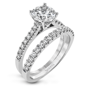 ROUND-CUT ENGAGEMENT RING & MATCHING WEDDING BAND IN PLATINUM WITH DIAMONDS