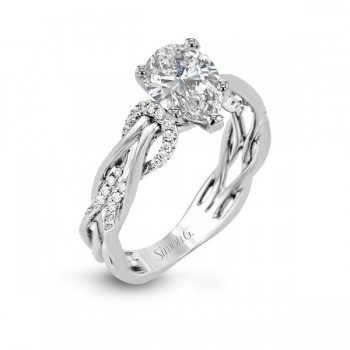 PEAR-CUT CRISS-CROSS ENGAGEMENT RING IN PLATINUM WITH DIAMONDS